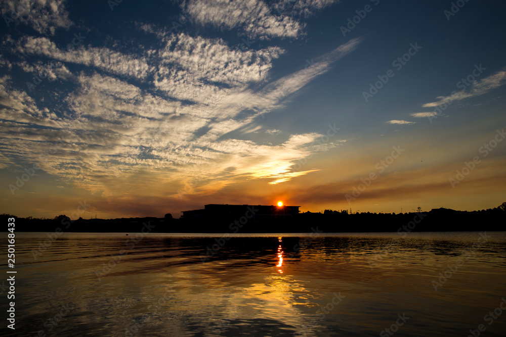 Beautiful Sunset sits on the lake