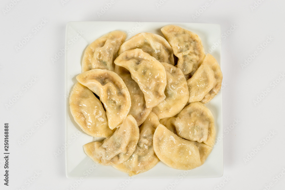 Dumplings on a white plate for cutting Dumplings on a white plate for cutting