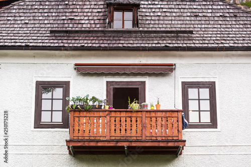 Old vintage wooden balconies in the Austrian city of Halltatt photo