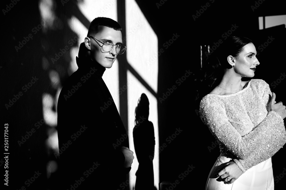 Beautiful young couple in classic suits Beautiful young couple in classic suits