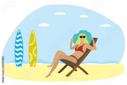 Sea coast scene,female in swimsuit,woman lies in lounge chair © naum