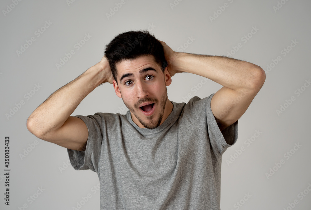 Close up portrait of young man with excited facial expression surprised of success Close up portrait of young man with excited facial expression surprised of success