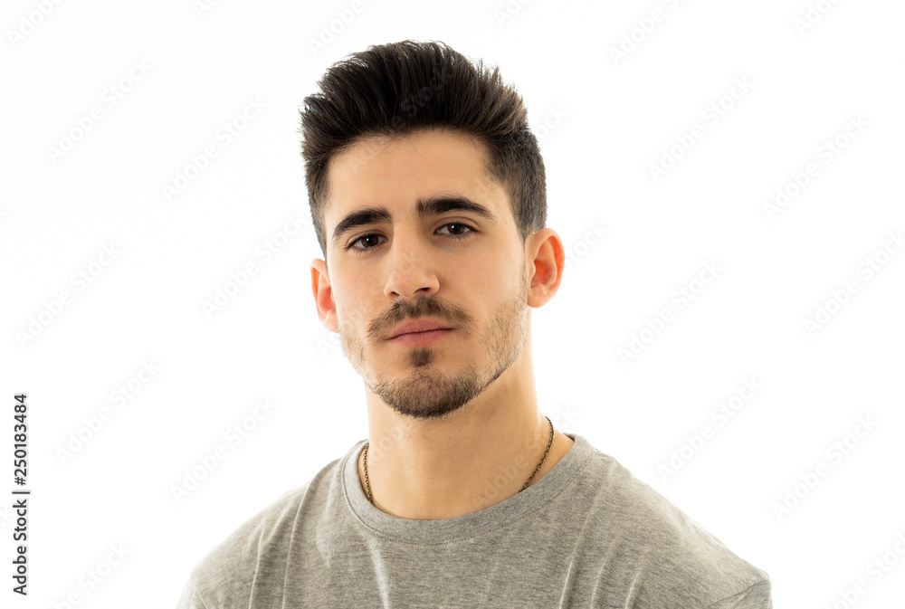 Portrait of handsome young man in neutral poker facial expressions and human emotions Portrait of handsome young man in neutral poker facial expressions and human emotions