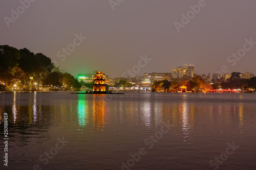 Night view of Turtle Tower or Tortoise tower which is located in the middle of the Hoan Kiem Lake, Hanoi, Vietnam © evgeny_pylayev
