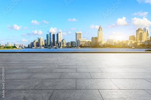 Empty square floor and Shanghai Bund commercial building