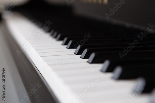 Piano keys in closeup perspective with shallow focus
