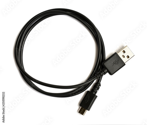 Black USB cable plug isolated on white background. USB - micro USB. photo