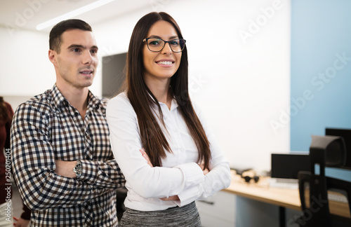 Portrait of business team posing in office © NDABCREATIVITY