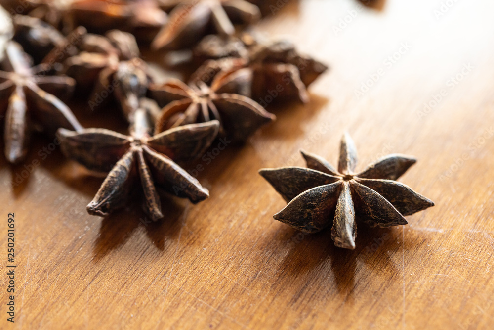 Macro of star anise on wooden table Macro of star anise on wooden table
