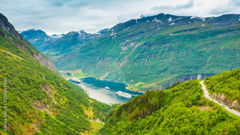 Fototapeta premium Fjord Geirangerfjord with ferry boat, Norway.