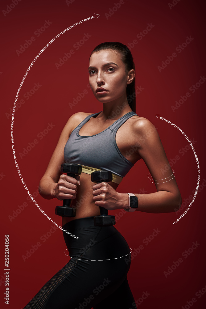 Love yourself enough to work harder. Sportswoman holds dumbbells standing over red background, looking away. Graphic drawing.