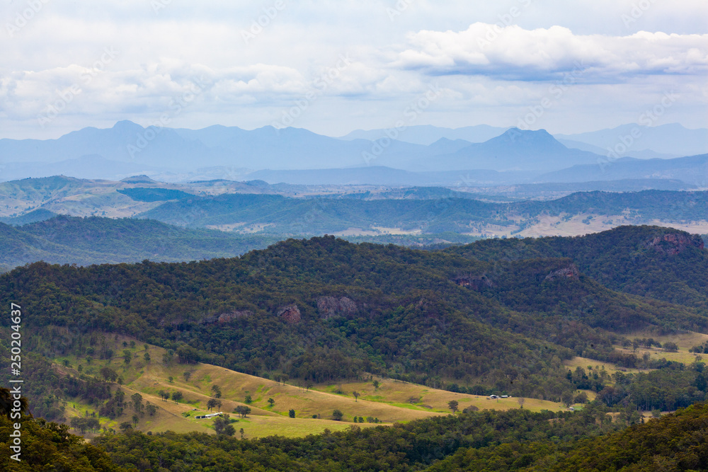 Rugged landscape of forested cliffs and hills in O'Reily, QLD, Australia