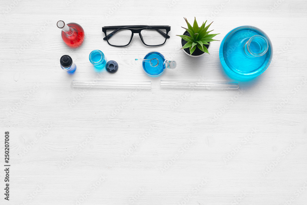 Pharmacy, medicine or chemistry background. Laboratory table with a ...