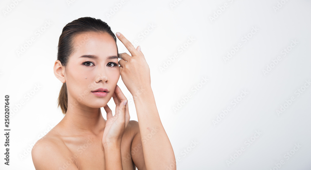 Asian Woman after applying make up hair style. no retouch, fresh face with acne, lips, eyes, cheek, nice smooth skin. Studio lighting white background, for aesthetics therapy treatment Asian Woman after applying make up hair style. no retouch, fresh face with acne, lips, eyes, cheek, nice smooth skin. Studio lighting white background, for aesthetics therapy treatment