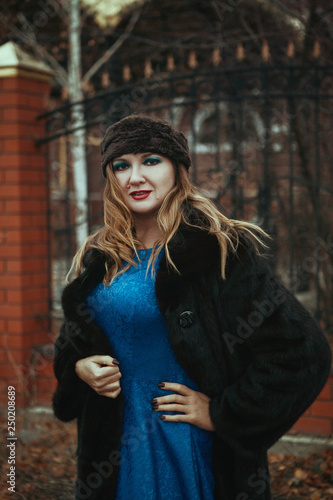 Lady is posing wearing Russian style