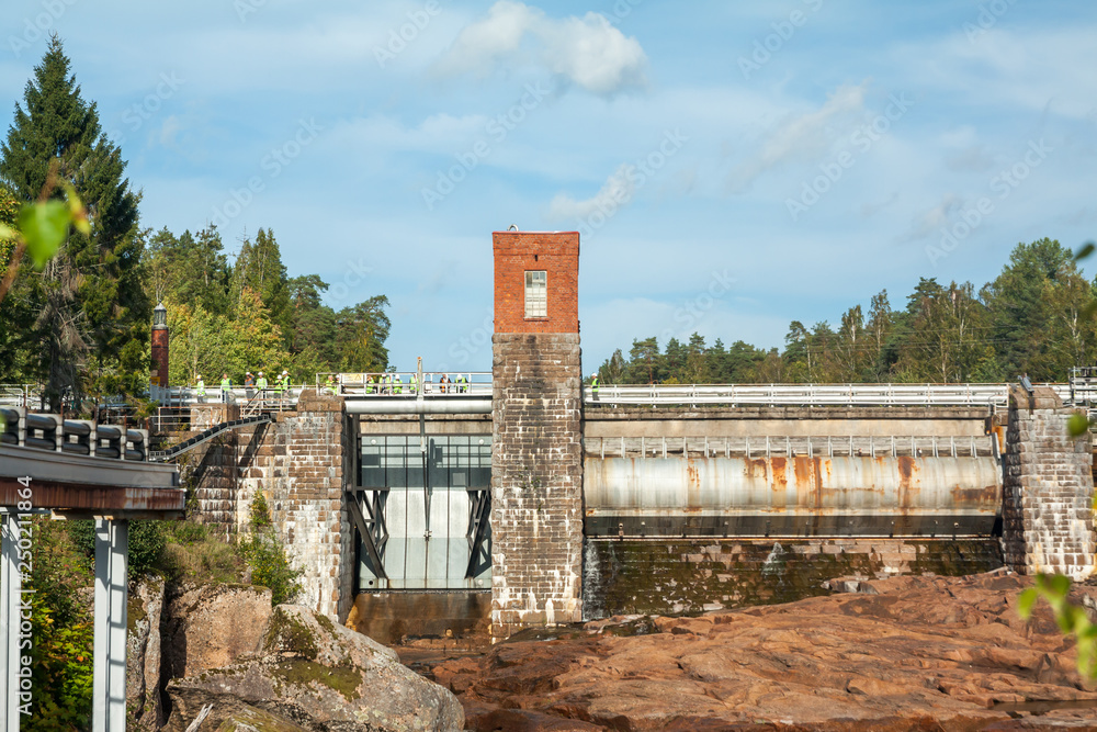 KOUVOLA, FINLAND - SEPTEMBER 20, 2018: Hydroelectric power generation plant and Ankkapurha Industrial Museum at Kymijoki river, Finland