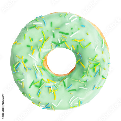 Green donut decorated with colorful sprinkles isolated on white background. Flat lay. Top view photo