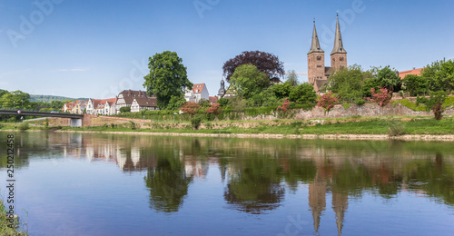 Weser river and the skyline of Hoxter, Germany