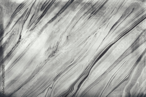 Black grungy marble texture as background. Abstract marble background