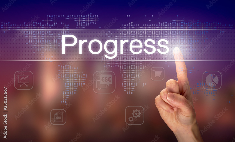 A hand selecting a Progress business concept on a clear screen with a colorful blurred background.