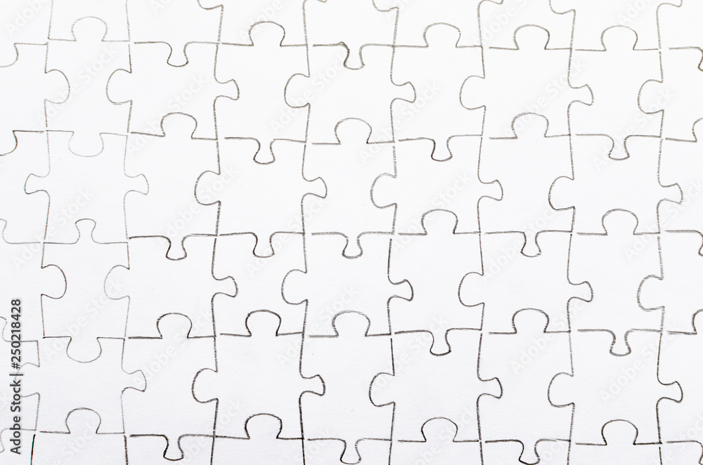 Assembled puzzle on light background.