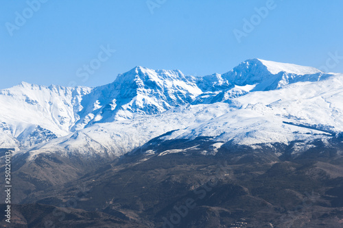 Snow capped mountain peak