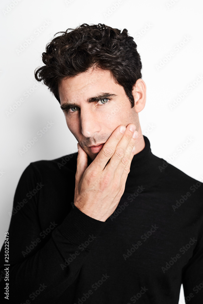 Good looking guy in thoughtful pose, portrait Good looking guy in thoughtful pose, portrait