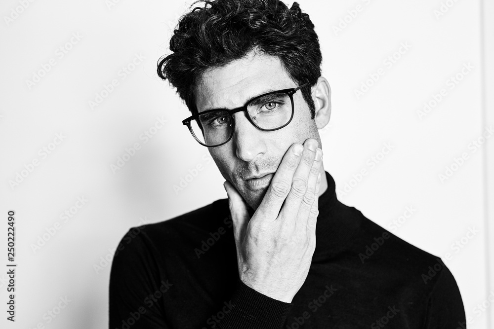 Handsome guy in glasses, studio shot Handsome guy in glasses, studio shot