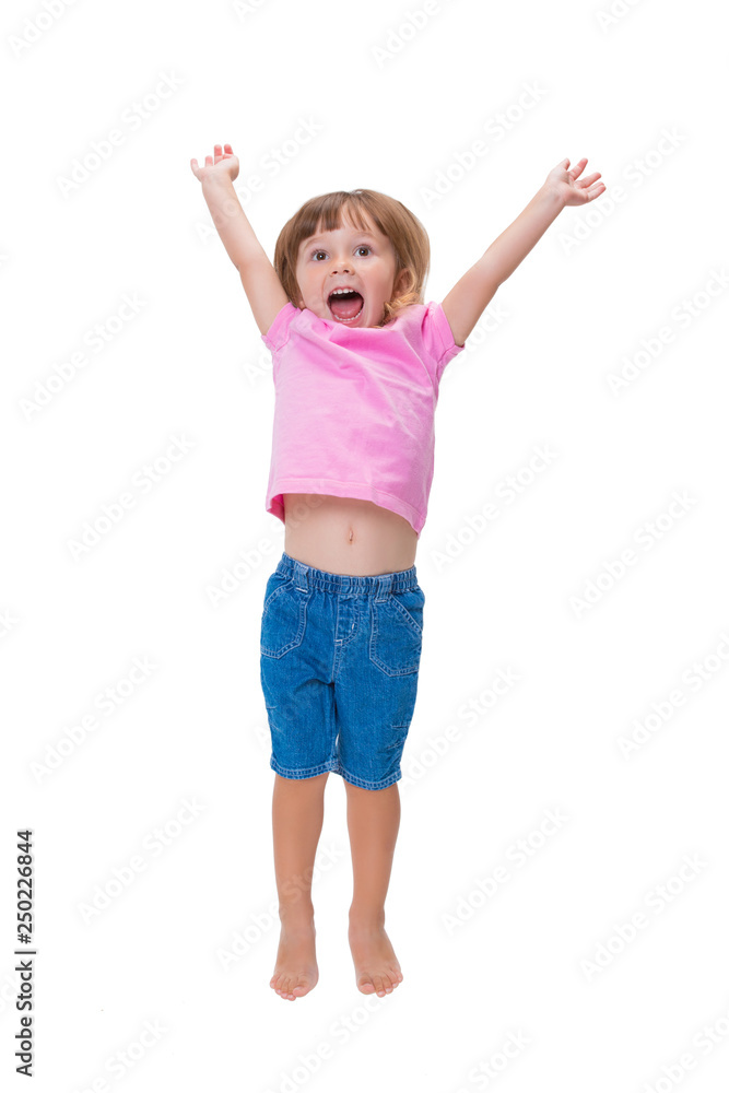 Cheerful positive little girl 3 years old happily jumping up and screaming cheers isolated on white background. Happy childhood and emotions Cheerful positive little girl 3 years old happily jumping up and screaming cheers isolated on white background. Happy childhood and emotions