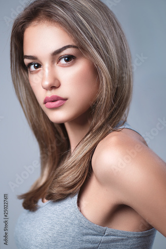 Beautiful Girl With Big Eyes Studio Portrait Of A Young Girl On A Gray Background Girl