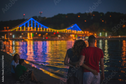 young couple at night © Max Vodianytskyi
