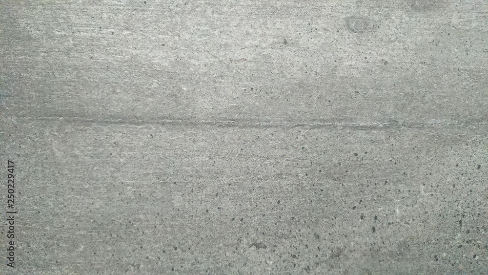 The abstract background of a old gray wall. Selective focus. The abstract background of a old gray wall. Selective focus.