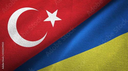 Turkey and Ukraine two flags textile cloth, fabric texture