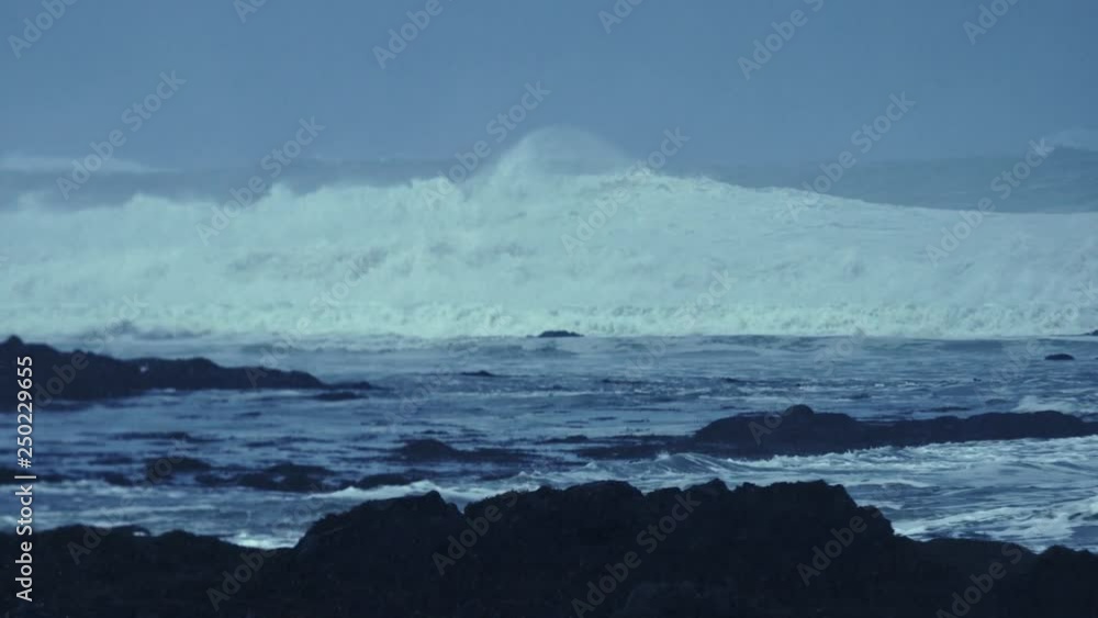 Giant waves crashing into shore Giant waves crashing into shore