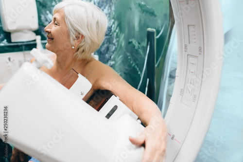 Εκτύπωση καμβά Senior woman having a mammography scan at hospital