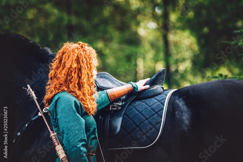 Merida and the Shire horse Angus of the Disney movie Brave photo