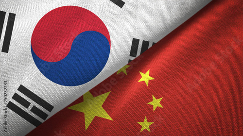 Photography South Korea and China two flags textile cloth, fabric texture