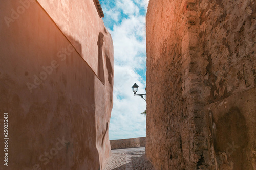 Street of the old town of Dalt Vila, Ibiza, Spain in the morning. Architecture, travel and historical concept. 