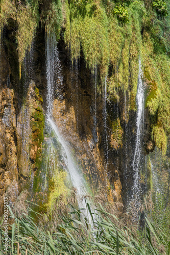 multiple waterfalls in sunny plitvice national park croatia