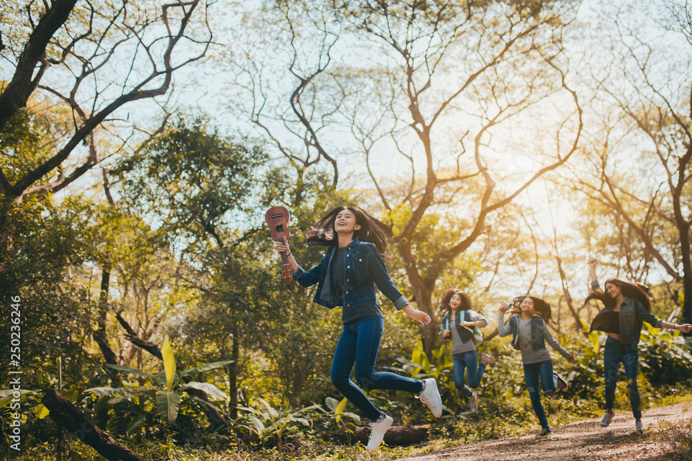 Group of Young Asian women jumping enjoy travel trekking to destination in vacation time for go to camping. Group of Young Asian women jumping enjoy travel trekking to destination in vacation time for go to camping.