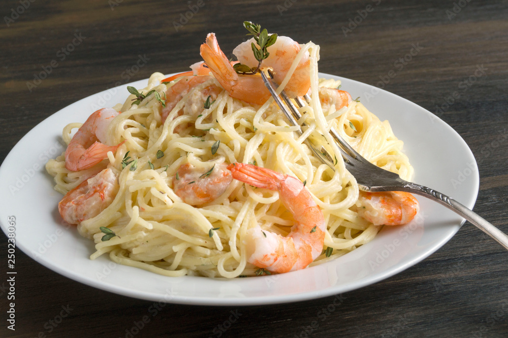 spaghetti cream cheese white sauce with shrimp - Italian food style spaghetti cream cheese white sauce with shrimp - Italian food style