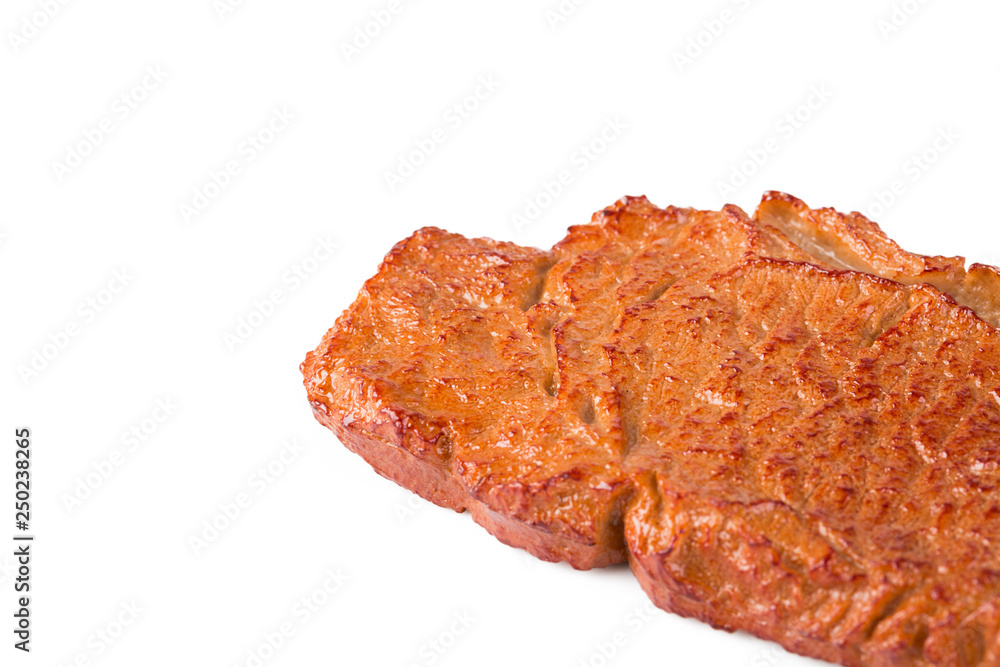 Beef steak on white background, close-up. Beef steak on white background, close-up.