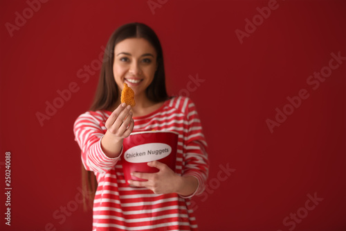 Beautiful woman with bucket...