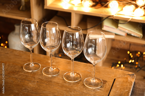Empty wineglasses on wooden table