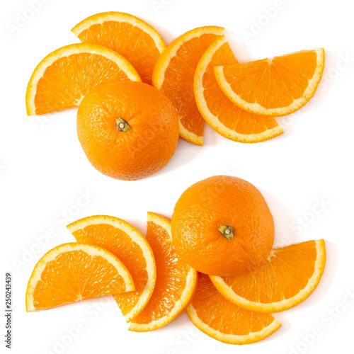 Orange fruit slice layout isolated on white background closeup. Food background. Flat lay, top view.