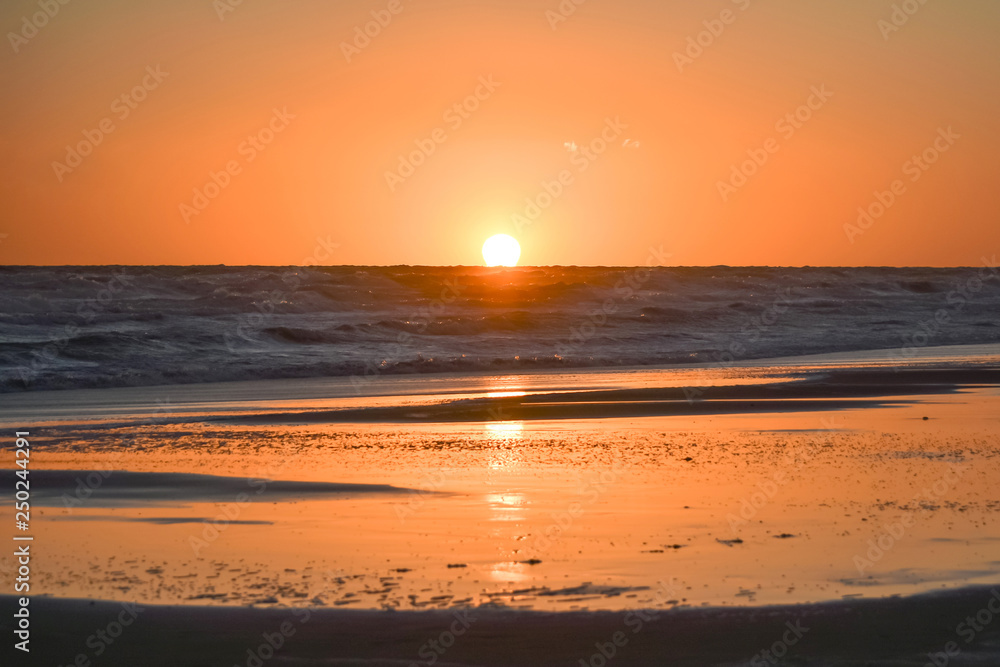 The sunset on the beach