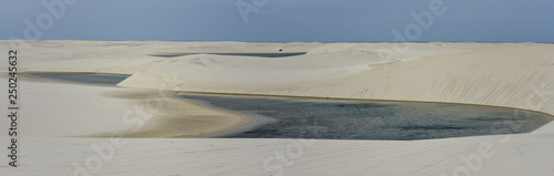 Lagoon on the middle of the dunes at Lencois Maranhenese National Park, Brazil photo