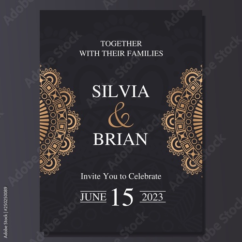 Luxury and elegant wedding invitation card with mandala ornament. Dark and golden color background.