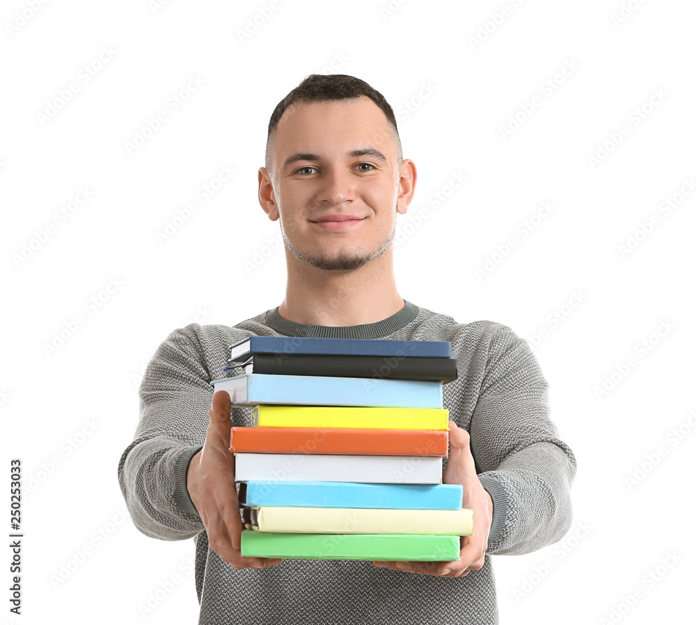 Handsome young man with books on white background Handsome young man with books on white background
