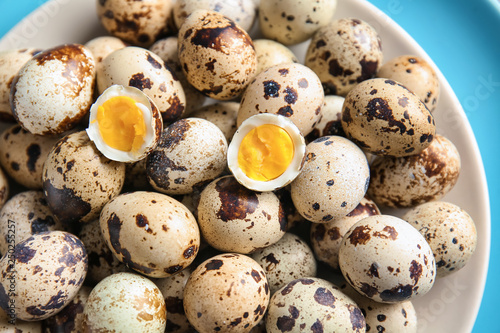 Boiled quail eggs on plate, closeup